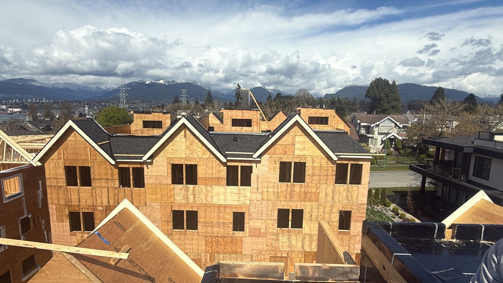 Storm-damaged Willoughby roof mid-tarp during emergency response